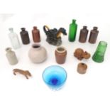 A quantity of assorted miscellaneous items to include stoneware pots, glass bottles, a novelty