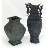 Two Oriental cast vases with stylised animal decoration Please Note - we do not make reference to