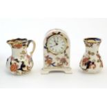 Three Mason's ironstone items in the pattern Mandalay to include a mantel clock, a jug and a vase.