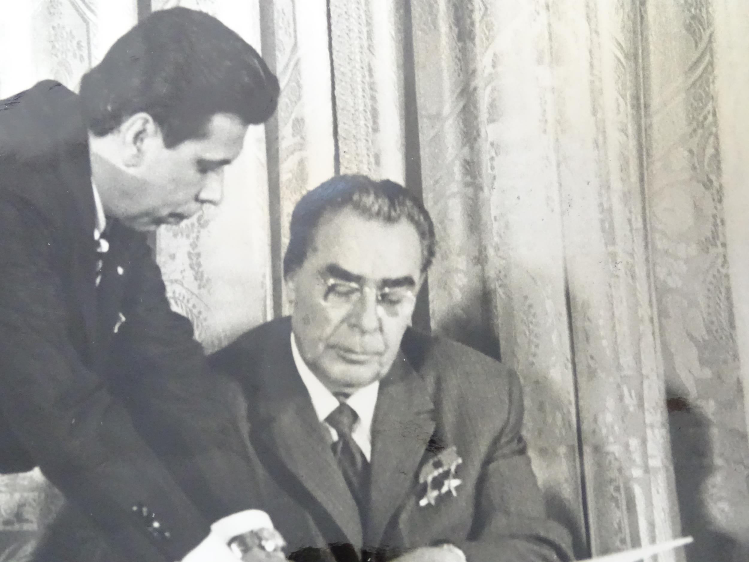 A 20thC monochrome press photograph depicting Soviet leader Leonid Brezhnev and President Richard - Image 2 of 7