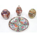 A quantity of assorted Oriental items to include a Cantonese style plate decorated with figures,