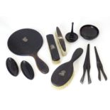 A quantity of ebony dressing table items etc, some with silver mounts Please Note - we do not make