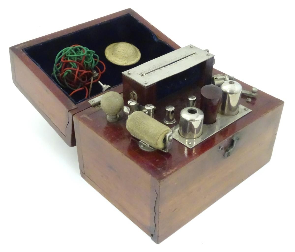 A mahogany cased Ever-Ready Electric Coil, model no. 290, made by the British electrical specialists