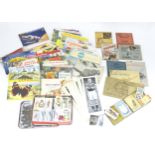 A quantity of Brooke Bond tea picture cards within series books, together with loose cigarette