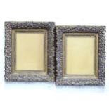 A pair of modern picture / painting frames with moulded floral and foliate detail. Aperture