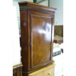 A 20thC mahogany corner cupboard. Approx. 39" high x 26 1/2" wide Please Note - we do not make