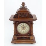 An early 20thC German mantle clock by Thomas Haller. Approx 10" high Please Note - we do not make