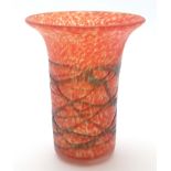 A studio glass vase with red flecked ground and trailed decoration. Approx 7" high Please Note -