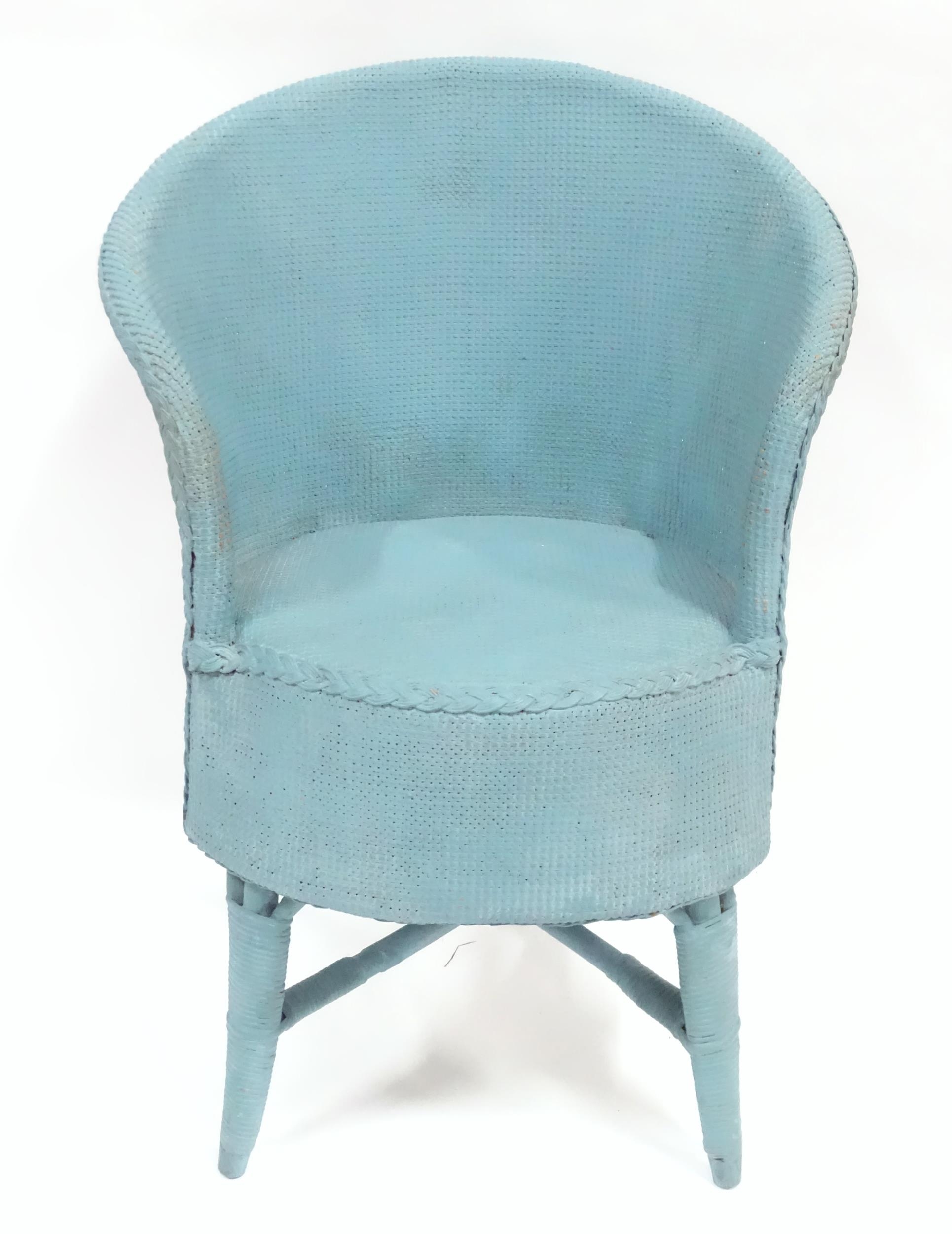 Lloyd loom style chair Please Note - we do not make reference to the condition of lots within