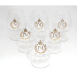 Six brandy / spirit glasses each decorated within gilt insignia of a crowned N within a wreath.