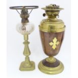 Two Victorian oil lamps. One marked ' Sales Safety burner'. Each appprox 14" high (2) Please