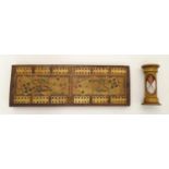 A late 19th / early 20thC cribbage board with playing card decoration, together with a treen egg /