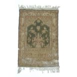 Carpet / Rug : A rug / wall hanging, the central olive green ground with scrolling floral and