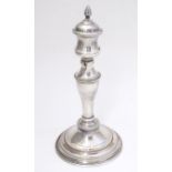 A 20thC Welsh silver plate candlestick marked under ' Made in Wales' and stamped with makers