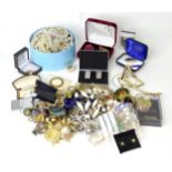 A quantity of assorted jewellery to include various necklaces, brooches, earrings etc. Together with