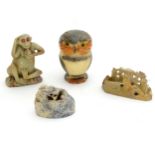 Four various soapstone items , one formed as an owl, one a monkey and two other Oriental examples.