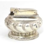 A silver plated Ronson table lighter Please Note - we do not make reference to the condition of lots