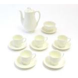 A quantity of Royal Doulton coffee wares comprising coffee pot, cups and saucers. Marked under.