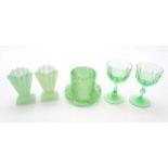 5 items of Uranium green glass comprising two pedestal drinking glasses, a pair of Art deco vases