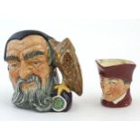 A Royal Doulton small character jug modelled as Merlin, marked under D6536. Together with model of a