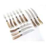 A set of 6 antler handled steak knives and forks by W R Humphreys & Company . The knives 8" long