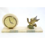 A 20thC late Art deco onyx mantle clock with stylised pelican decoration 17 3/4" wide x 4" deep x