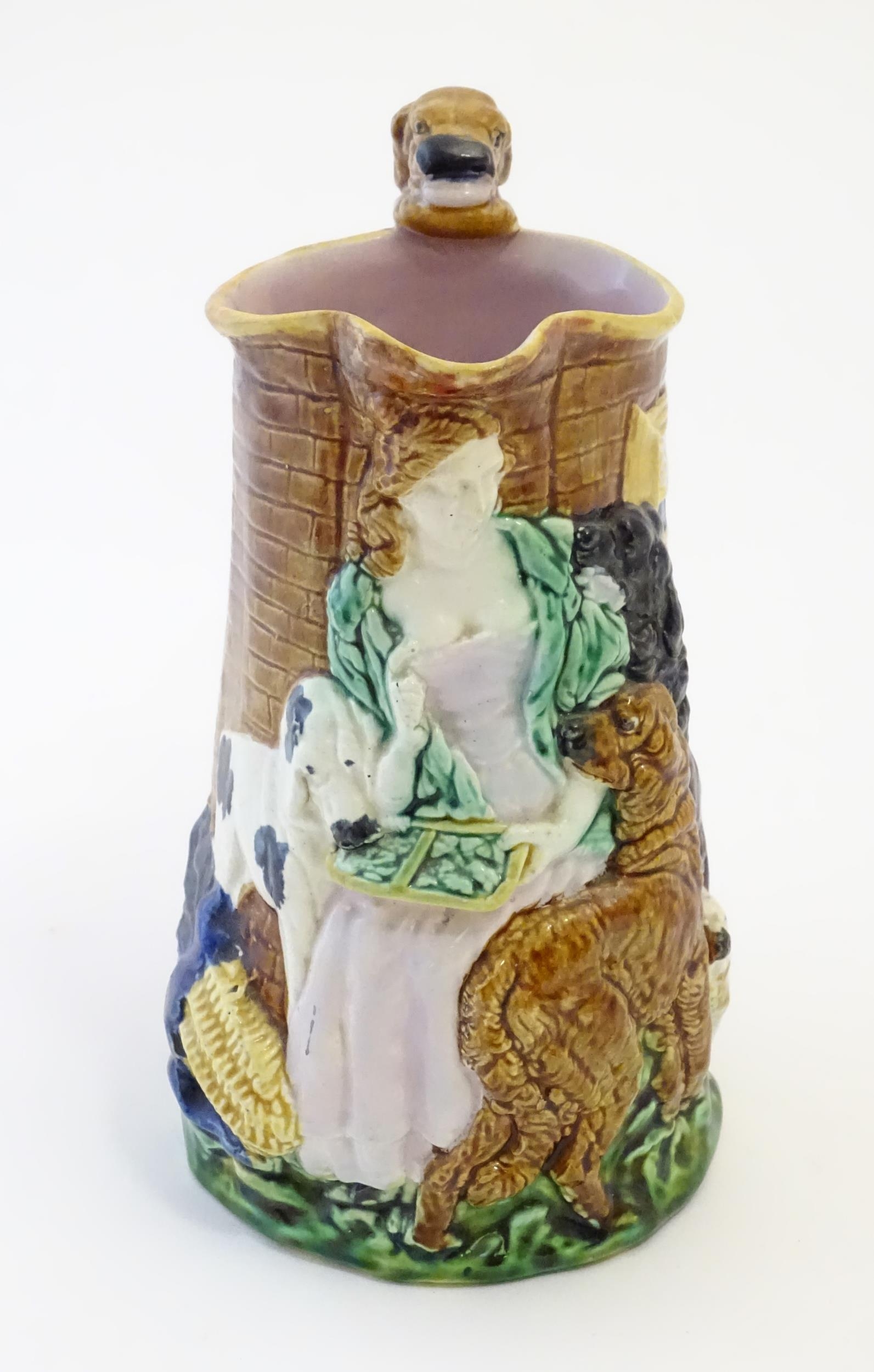 A Burleigh ware jug Old Feeding Time, with moulded relief decoration depicting a woman with dogs. - Bild 5 aus 11