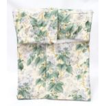 2 pairs of Colefax and Fowler curtains with a pale blue and green floral pattern. Each curtain