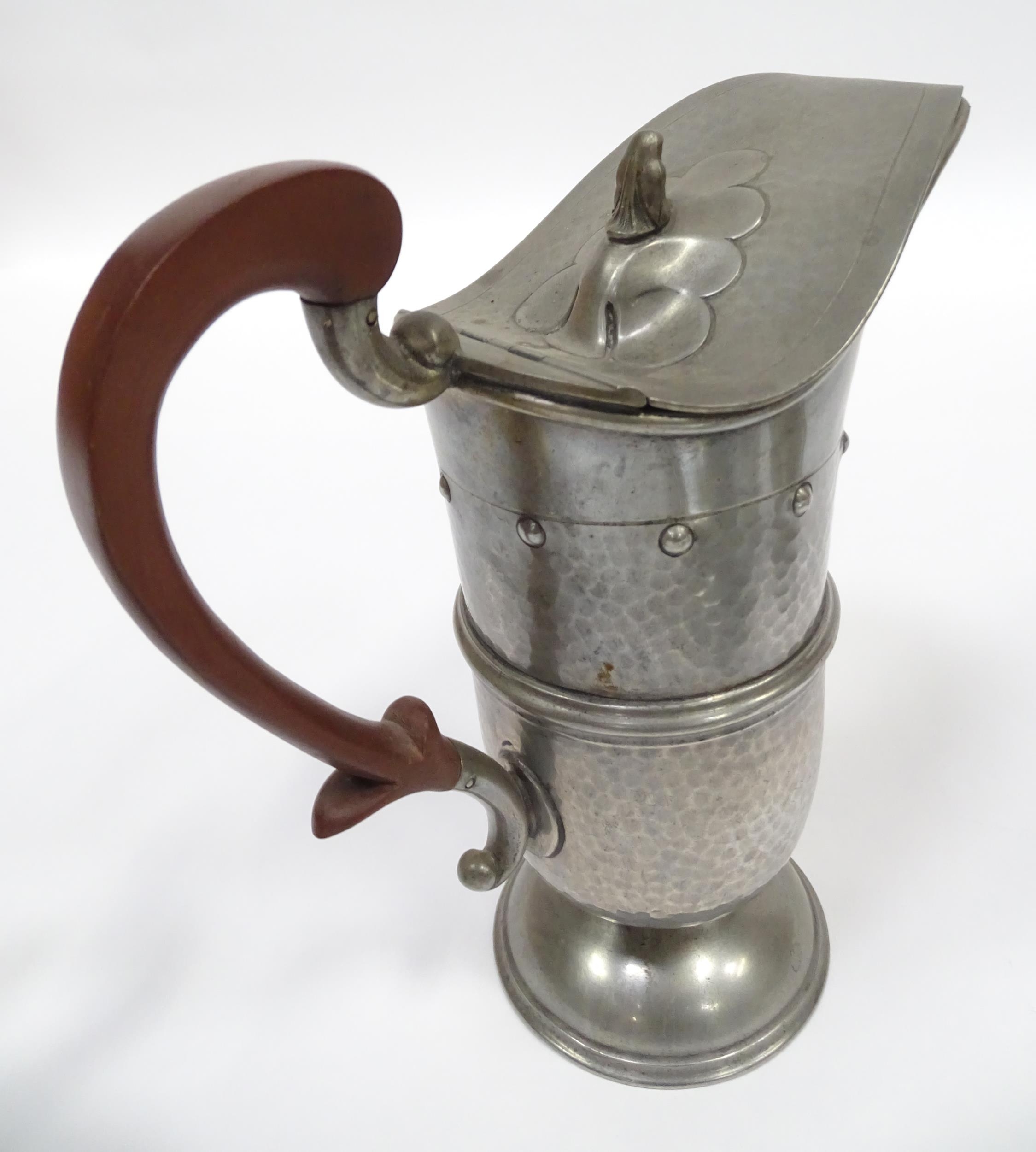 A quantity of Arts & Crafts style pewter tea wares with hammered decoration comprising teapot, - Image 10 of 18