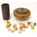 Toys: A treen 19thC turned fruitwood pot and cover containing an assortment of dice, together with a