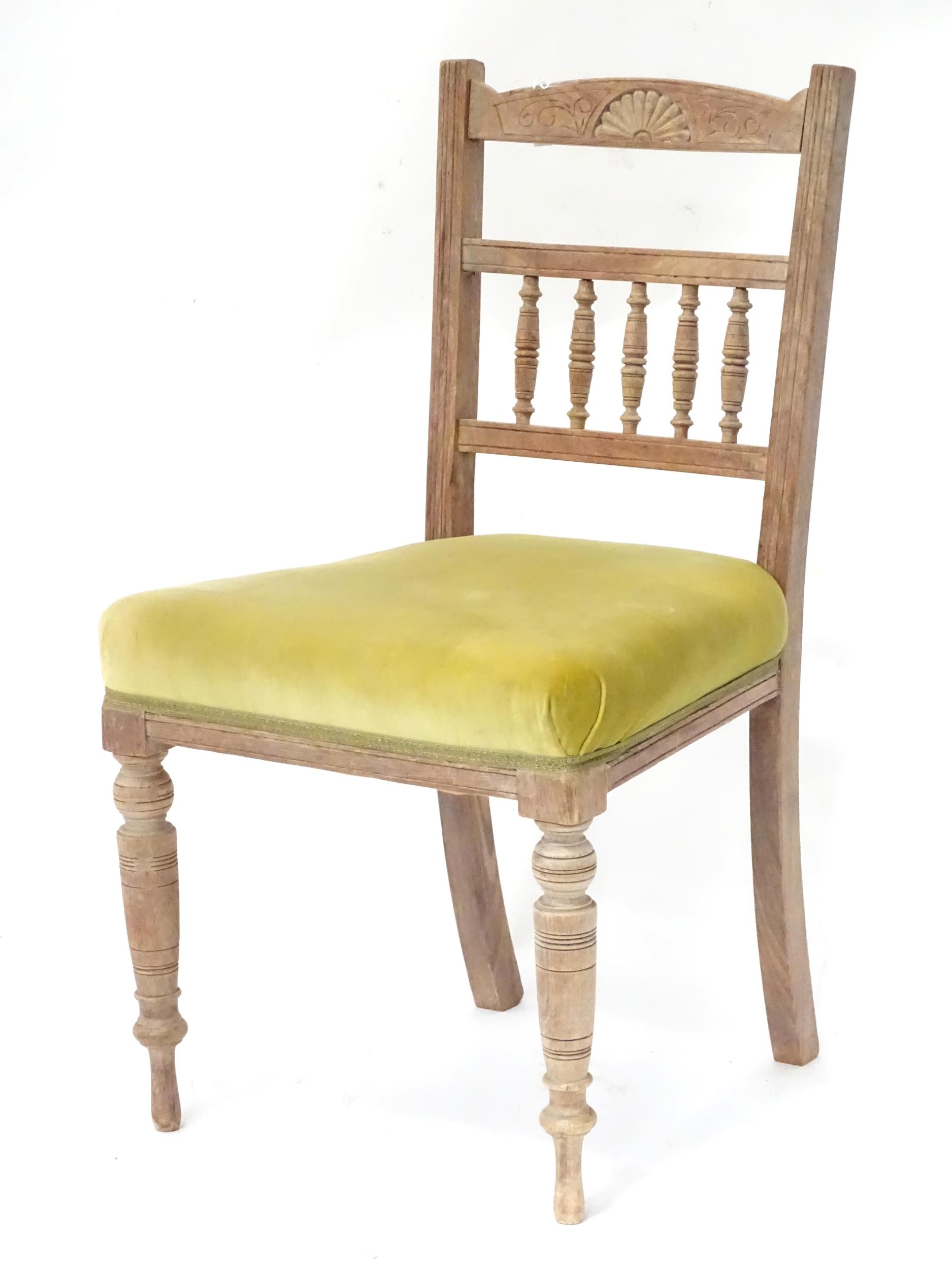 An early 20thC dining chair with upholstered seat. Approx. 34" high Please Note - we do not make