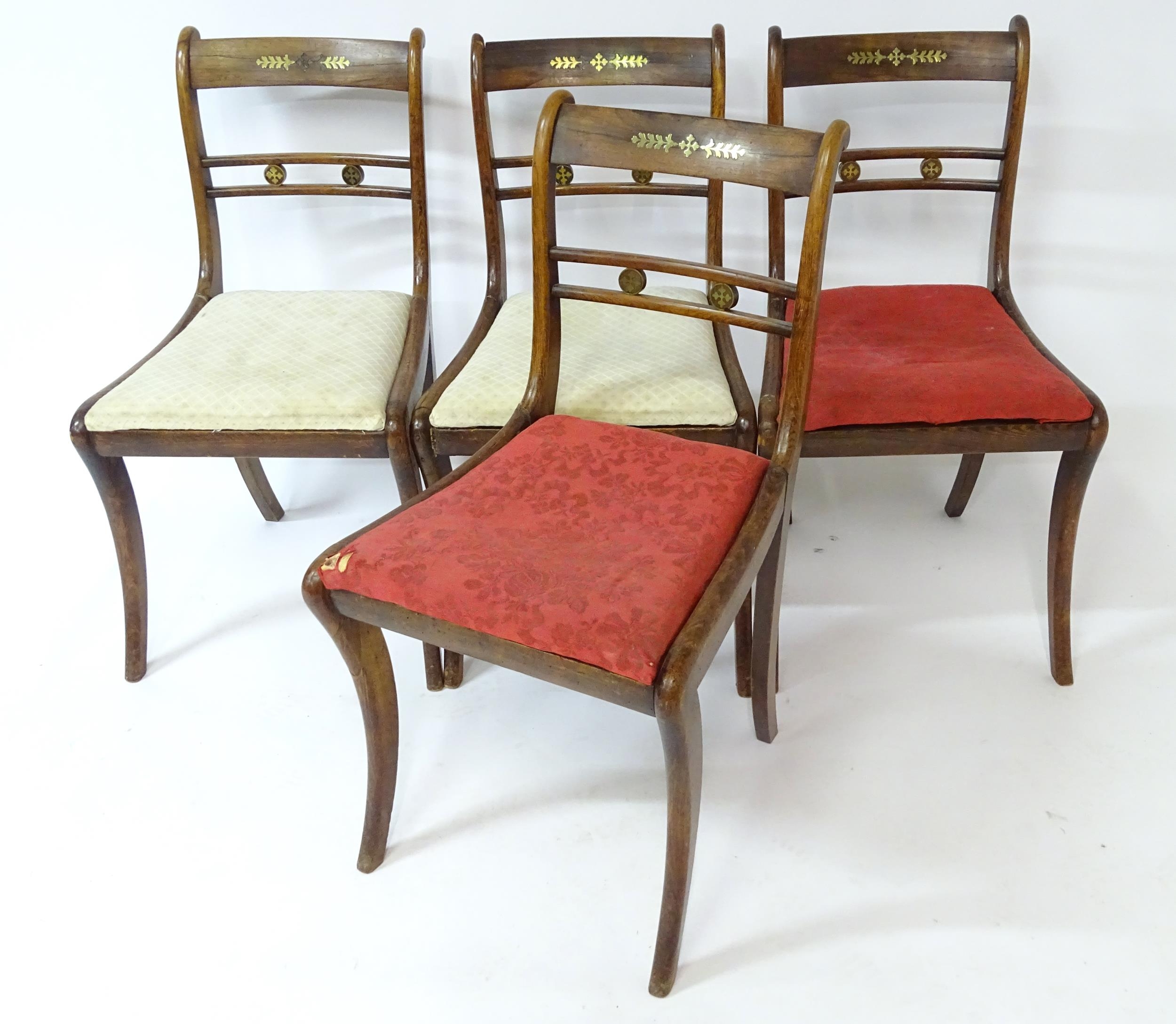 Four regency rosewood chairs with brass inlay. 31" high overall Please Note - we do not make