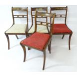 Four regency rosewood chairs with brass inlay. 31" high overall Please Note - we do not make