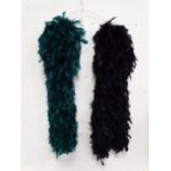 Two feather boas, one black, one green / teal. (2) Please Note - we do not make reference to the