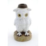 A late 19th / early 20thC Continental porcelain lamp base modelled as an owl. Impressed marks EBS 28