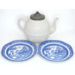 Two blue and white plates decorated in the Willow pattern, together with a large teapot with