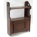 Wall hanging cupboard 15" wide Please Note - we do not make reference to the condition of lots