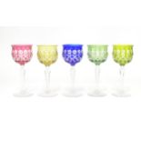 Five coloured hock glasses, approx. 7" high Please Note - we do not make reference to the