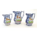 A set of three Victorian graduated jugs with stag / deer decoration and Sunderland lustre and Flo