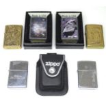 Assorted Zippo lighters including one commemorating the 1969 moon landing. (6) Please Note - we do