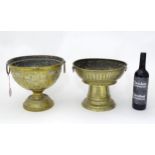 Two brass pedestal bowls. Probably Indian. The tallest approx 10 1/2" high (2) Please Note - we do