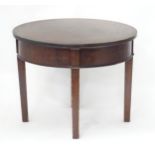 A Victorian mahogany circular occasional table by Wylie & Lochhead, Glasgow. Top approx. 23 1/2"