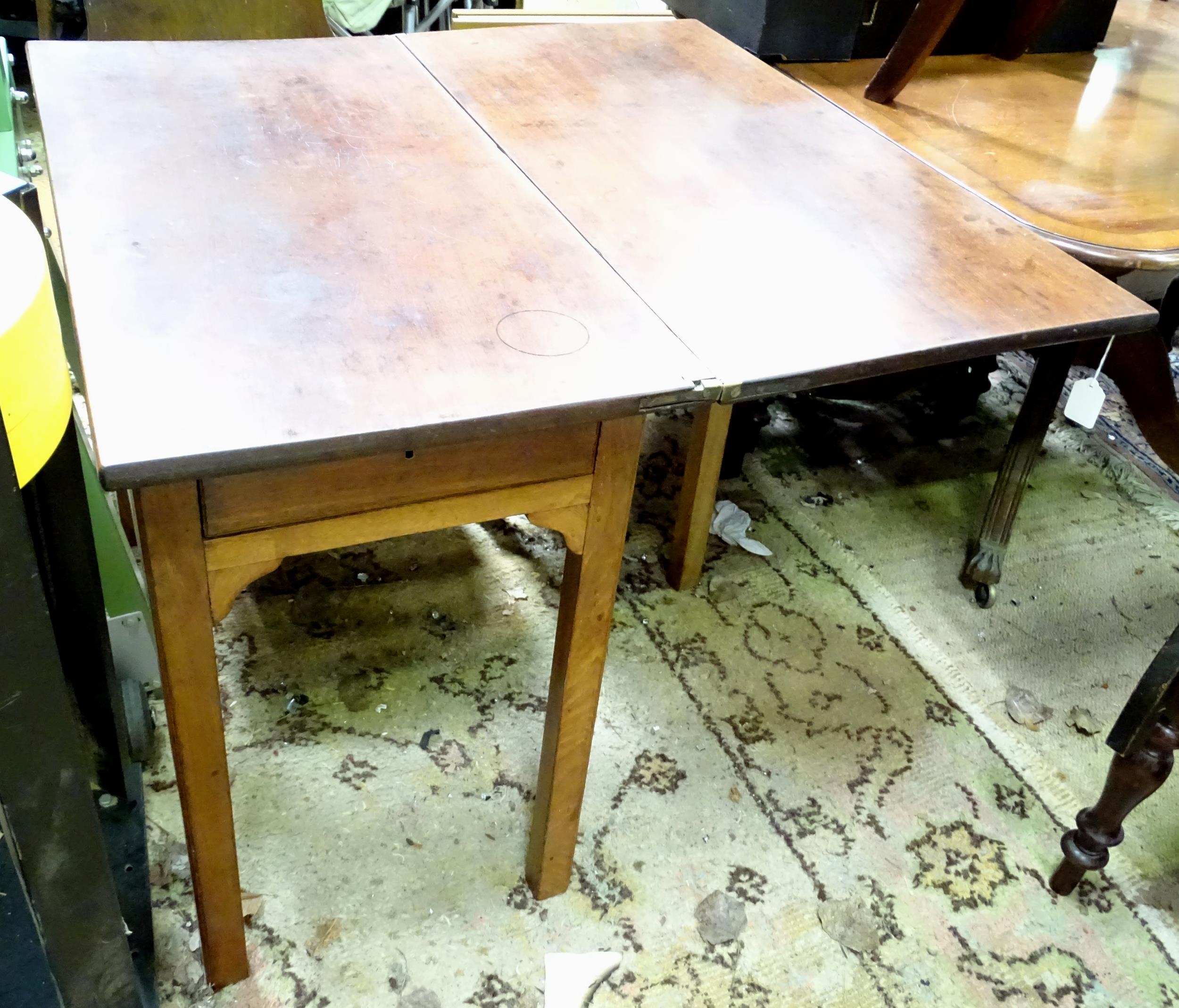 A 19thC mahogany fold over tea table. Top approx. 35" x 35" extended x 27 1/2" high Please Note - we