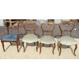 Four 19thC oak balloon back dining chairs with upholstered seats. Approx. 33 1/2" high (4) Please