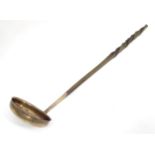 A 19thC toddy ladle with white metal bowl. Approx 14" long Please Note - we do not make reference to