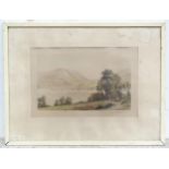 A signed colour etching after Henry George Walker (1876-1932) depicting a highland loch. Signed in