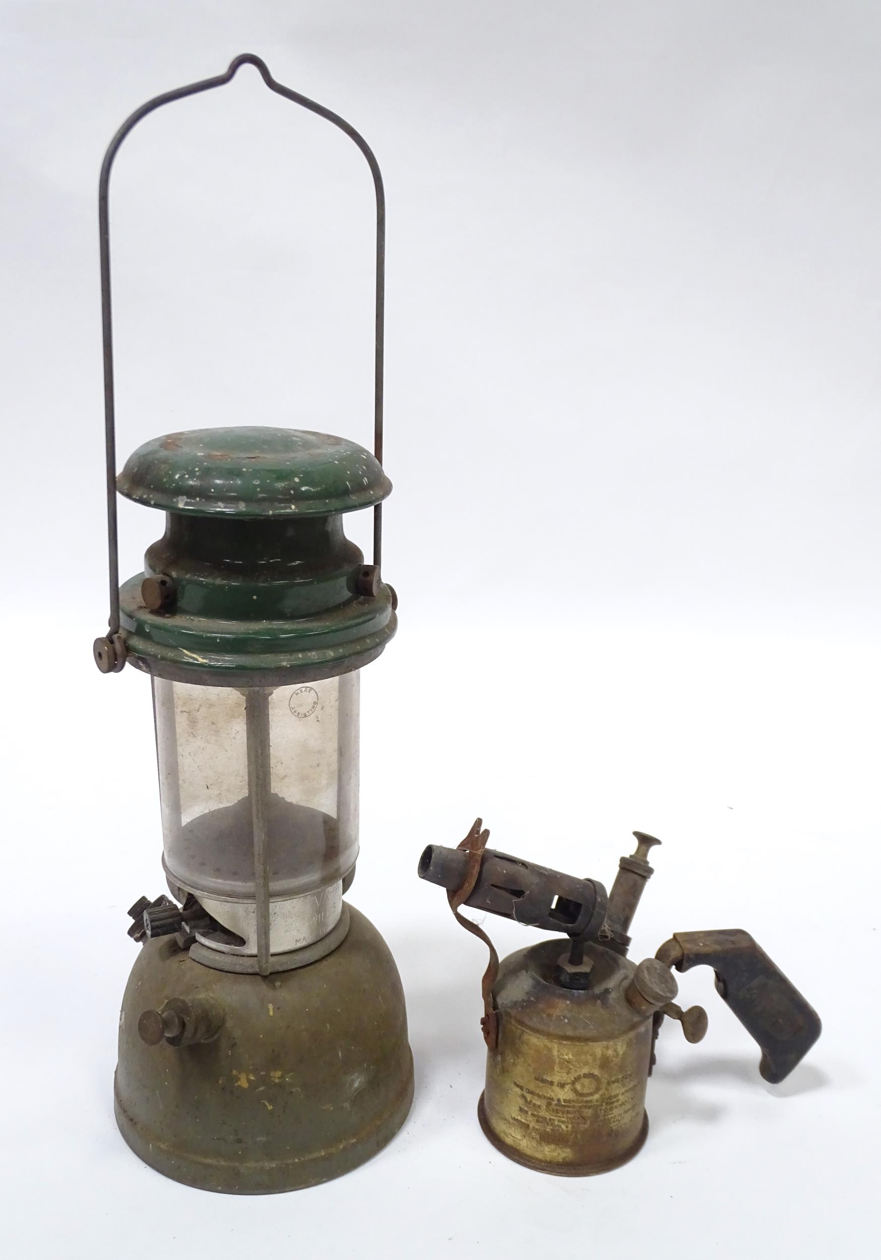 A Military oil lamp and blowtorch (2) Please Note - we do not make reference to the condition of
