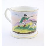 A Staffordshire mug decorated with a landscape scene depicting a man with a shotgun, a gun dog and a