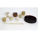 A quantity of assorted bone sewing spools, treen tape measure etc Please Note - we do not make