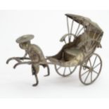 Oriental white metal miniature model of a man pulling a rickshaw. Approx 3 1/4" long Please Note -